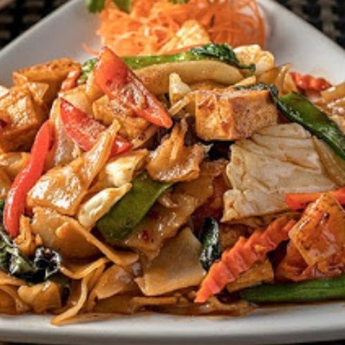 steamed vegetables on triangle plate